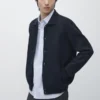 100 % bomullsstrikket cardigan med Pologensere 100 % bomullsstrikket cardigan med Pologensere