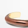 Armbånd med patinaeffekt i bronse