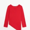 Asymmetrisk strikket genser Asymmetrisk strikket genser