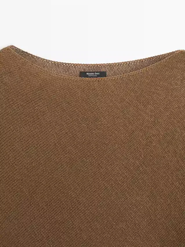 Asymmetrisk strikket kappe-genser Asymmetrisk strikket kappe-genser