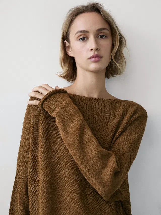 Asymmetrisk strikket kappe-genser Asymmetrisk strikket kappe-genser