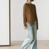 Asymmetrisk strikket kappe-genser Asymmetrisk strikket kappe-genser
