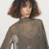 Broderte, halvtransparente bluse