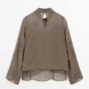 Broderte, halvtransparente bluse