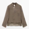 Broderte, halvtransparente bluse