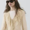 Cardigan i linblanding med volangdetaljer Cardigan i linblanding med volangdetaljer