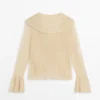 Cardigan i linblanding med volangdetaljer Cardigan i linblanding med volangdetaljer