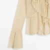 Cardigan i linblanding med volangdetaljer Cardigan i linblanding med volangdetaljer
