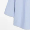 Flytende bluse med knappet krage