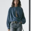 Flytende bluse med krysset foran