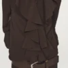 Flytende bluse med volanger
