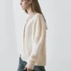 Kabelstrikket ullcardigan Kabelstrikket ullcardigan