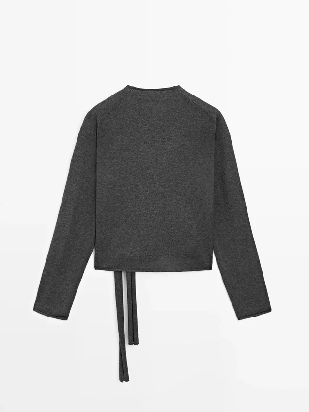 Krysset strikket cardigan med blonder Krysset strikket cardigan med blonder