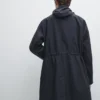 Lang parkas med hette