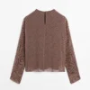 Løst sittende bluse med geometrisk mønster
