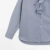 Skjorte med volangdetaljer på kragen