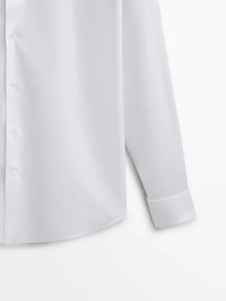 Slim fit-skjorte i bomull med doble mansjetter