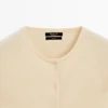 Strikkecardigan i ull med rund hals Strikkecardigan i ull med rund hals
