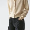 Strikkecardigan i ull med rund hals Strikkecardigan i ull med rund hals