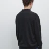 Strikkegenser med argyle-detaljer