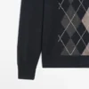 Strikkegenser med argyle-detaljer