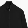 Strikket cardigan i bomullsblanding med raglanermer Strikket cardigan i bomullsblanding med raglanermer