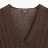 Strikket cardigan med detalj i midjen Strikket cardigan med detalj i midjen