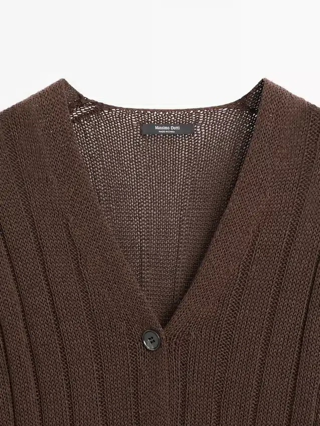 Strikket cardigan med detalj i midjen Strikket cardigan med detalj i midjen