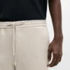 Total Look-linnebukser med detalj i livet Total Look-linnebukser med detalj i livet