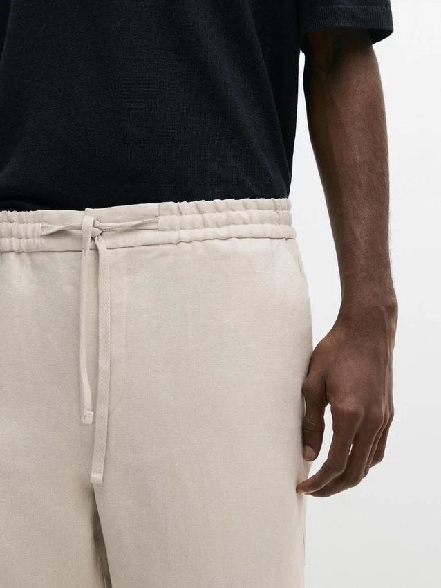 Total Look-linnebukser med detalj i livet Total Look-linnebukser med detalj i livet