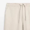 Total Look-linnebukser med detalj i livet Total Look-linnebukser med detalj i livet