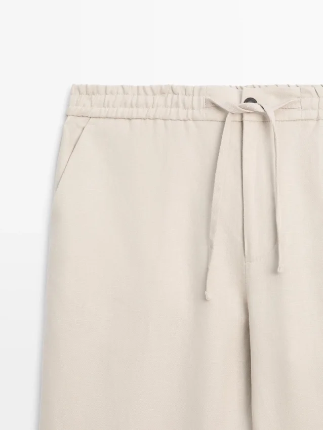 Total Look-linnebukser med detalj i livet Total Look-linnebukser med detalj i livet