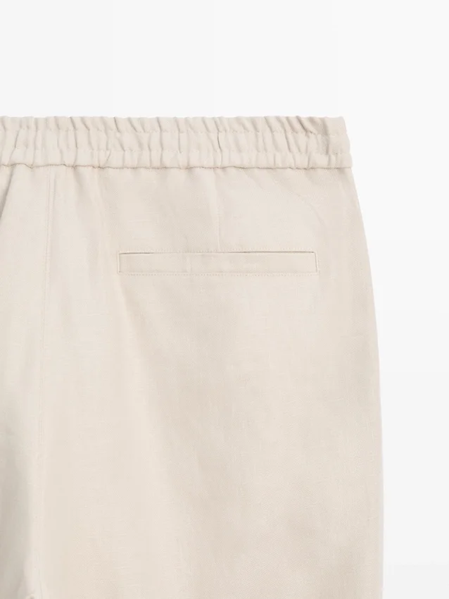 Total Look-linnebukser med detalj i livet Total Look-linnebukser med detalj i livet